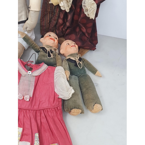 27 - A plastic headed Doll with fabric body, two Dolls with ceramic heads and fabric bodies, a small fabr... 