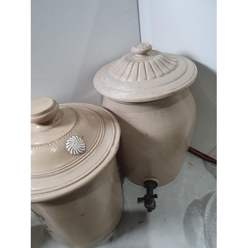 337 - A stoneware Urn with tap, an 