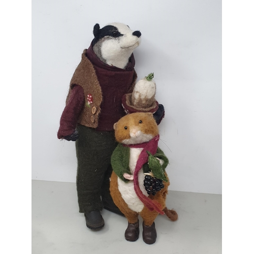 34 - A felt Badger, a felt Mouse with Blackberry, a pull along Chicken, a painted pull along Duck and som... 