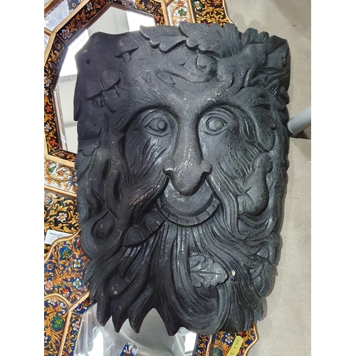 370 - Two decorative Wall Mirrors, a carved Green Man Mask and a cast iron Fire Curb (R5)