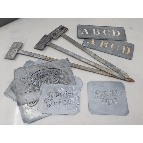 38 - Three metal Plant Name Stakes, a tray of Pastry Cutters, Stencils, Doctors Sign and Invoices Ledger ... 