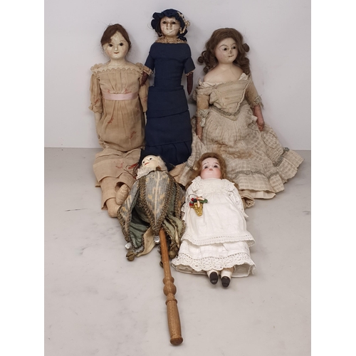 41 - A male Doll with torso mounted on turned handle, three antique wax headed Dolls with fabric bodies a... 