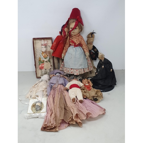 42 - Eight vintage Dolls and a fabric Rabbit