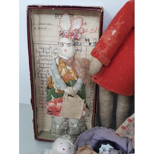 42 - Eight vintage Dolls and a fabric Rabbit