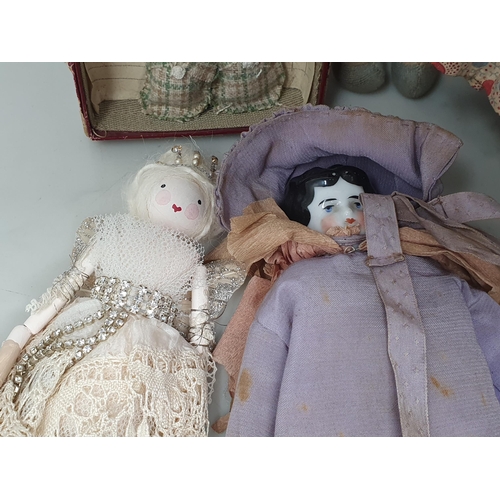 42 - Eight vintage Dolls and a fabric Rabbit