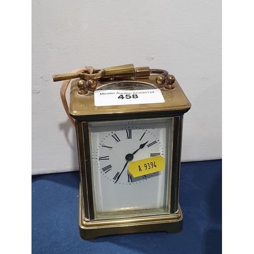 458 - A small brass Carriage Clock with white enamel dial, with key (Mez)