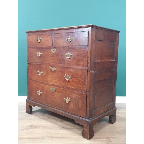 508 - An 18th Century oak Chest of two short and three graduated long drawers raised on ogee bracket feet ... 