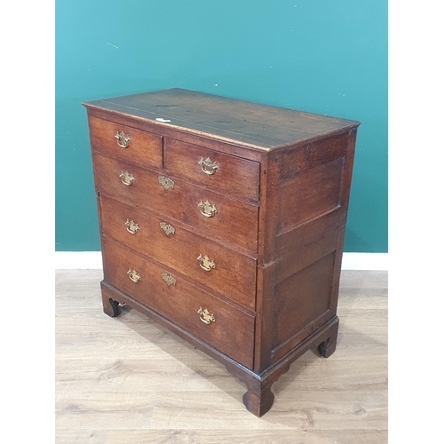 508 - An 18th Century oak Chest of two short and three graduated long drawers raised on ogee bracket feet ... 