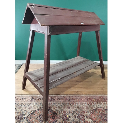 512 - An antique painted pine Saddle Horse with hinged compartment 4ft 4in H x 4ft 2in W