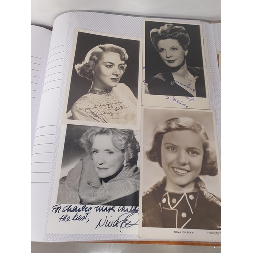 53 - Two Albums of Photographs of Film Stars, some signed. Includes Robert Mitchum, Jean Rogers, Deanna D... 