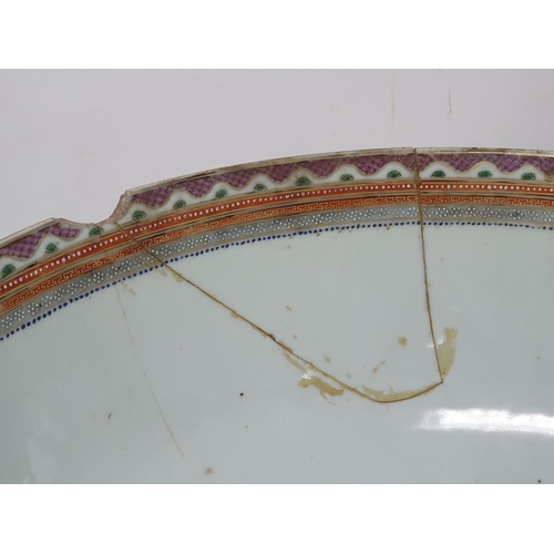 538 - An 18th Century Chinese Qianlong Punch Bowl with puce and gilt border A/F