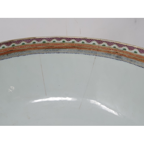 538 - An 18th Century Chinese Qianlong Punch Bowl with puce and gilt border A/F