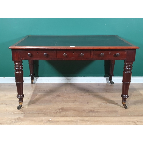 577 - A 19th Century mahogany Writing Table, the leathered top above three freize drawers opposed by dummy... 