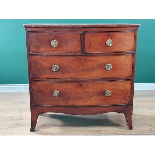 586 - A 19th Century mahogany bow fronted Chest of two short and two long drawers on splayed feet 2ft 11in... 