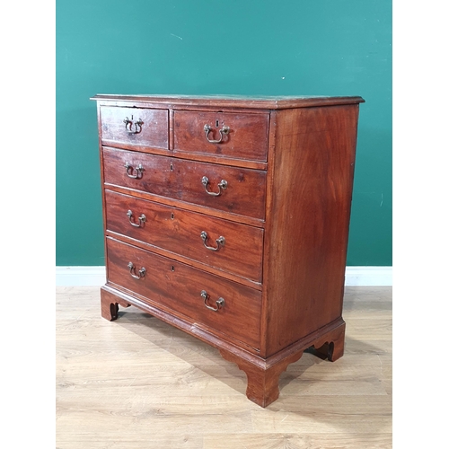 596 - A George III mahogany Chest fitted two short and three long graduated drawers raised on bracket feet... 