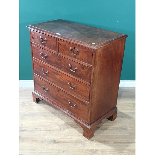 596 - A George III mahogany Chest fitted two short and three long graduated drawers raised on bracket feet... 