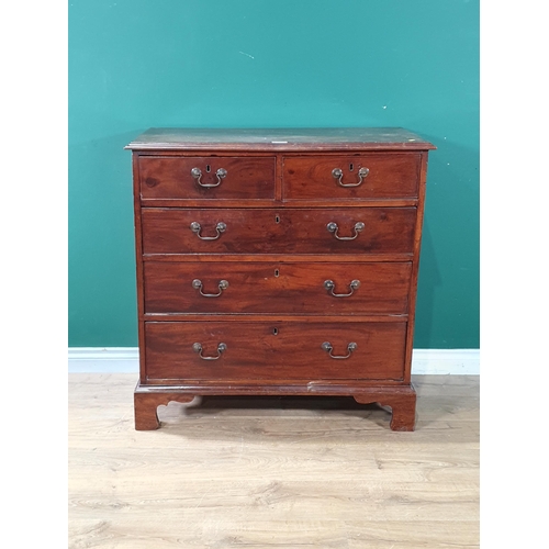 596 - A George III mahogany Chest fitted two short and three long graduated drawers raised on bracket feet... 