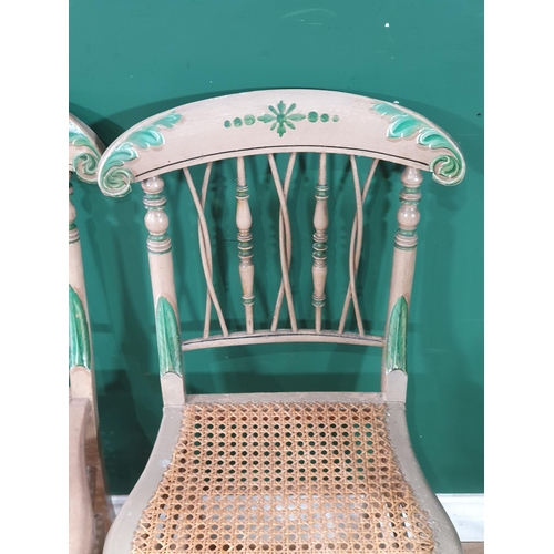 615 - A set of four 19th Century green painted Chairs with turned spindle, wicker crossed braces and cane ... 