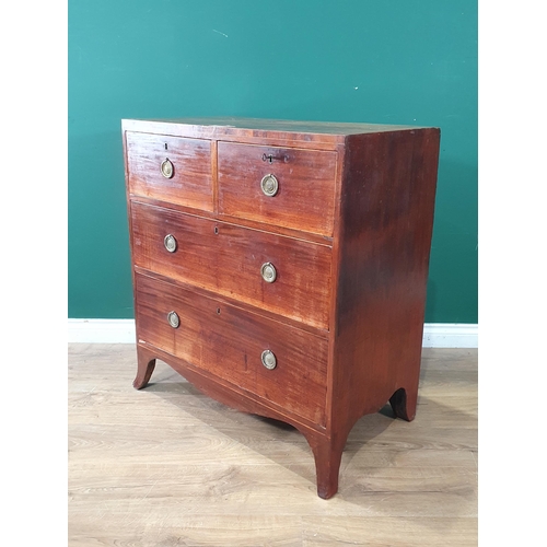 629 - A 19th Century mahogany and satinwood strung Chest of two short and two long drawers raised on splay... 