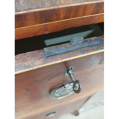 629 - A 19th Century mahogany and satinwood strung Chest of two short and two long drawers raised on splay... 