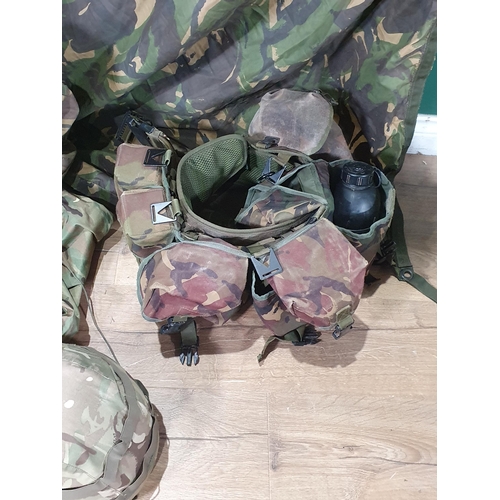 647 - A quantity of British Army Kit including Bergen, Helmet, Beret, Basher and Water Bottle (R7)