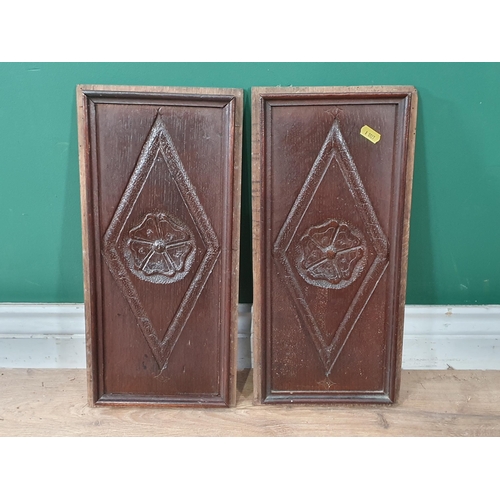 700 - A pair of 17th Century carved oak Panels with rose within lozenge 16 1/2in L (R9)