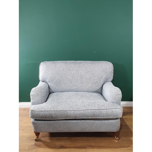 749 - A blue upholstered two seater Sofa on turned supports 3ft 10in W x 2ft 10in H and a quantity of Cush... 