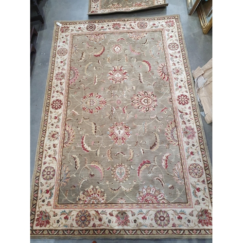 756 - A Nourison modern Rug with floral  border and with flowers and foliage on a beige ground, 8ft 3in x ... 