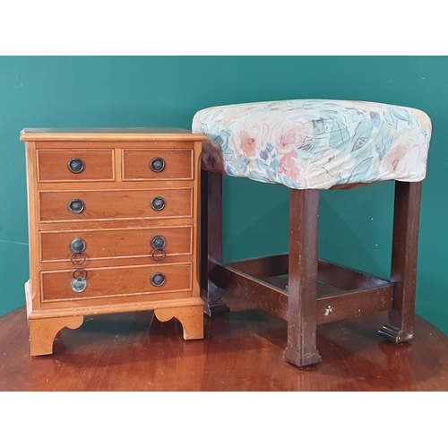 775 - A reproduction yew veneered Bedside Chest and a Dressing Stool (R8)