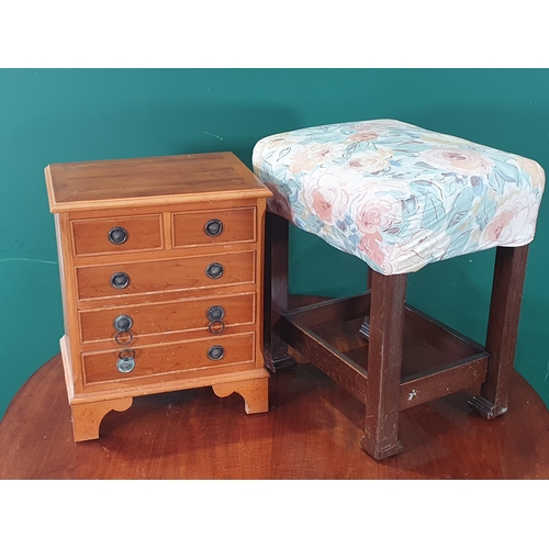 775 - A reproduction yew veneered Bedside Chest and a Dressing Stool (R8)