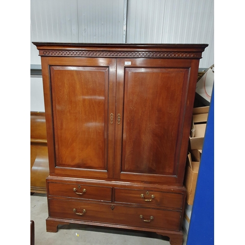 803 - A 19th Century Linen Press with blind carved frieze above pair of cupboard doors the base fitted two... 