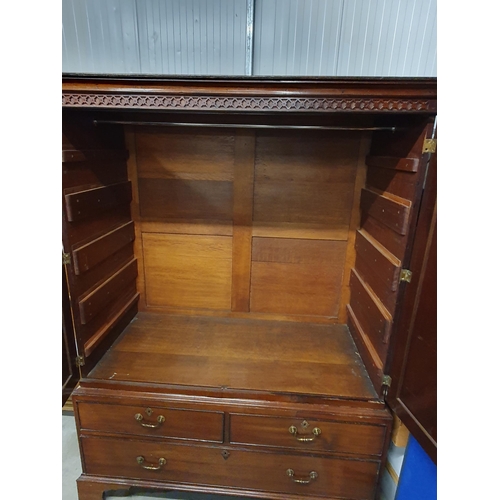 803 - A 19th Century Linen Press with blind carved frieze above pair of cupboard doors the base fitted two... 