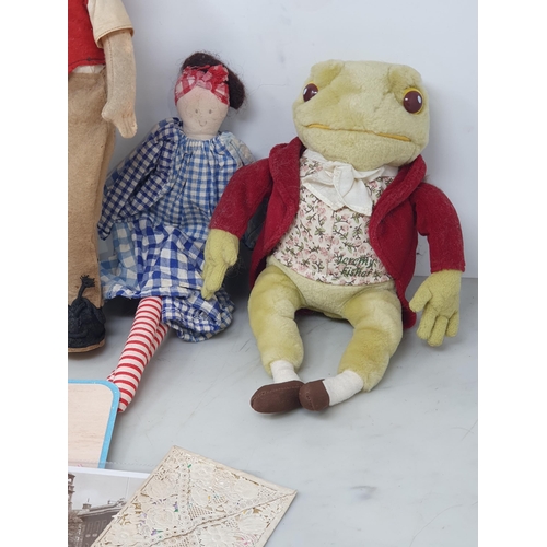 9 - Two fabric Rabbits, two plastic headed girl Dolls in riding costume, a frog soft toy, assorted Books... 