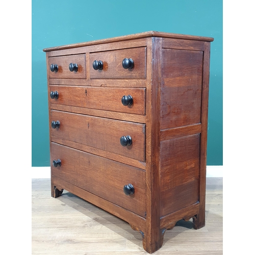 92 - A 19th Century oak Chest of two short and three long graduated drawers with ebonised turned knobs ra... 