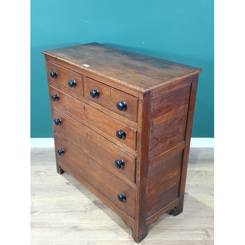 92 - A 19th Century oak Chest of two short and three long graduated drawers with ebonised turned knobs ra... 