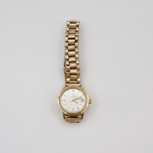 154 - A lady's Omega Geneve Automatic Wristwatch the silvered dial with hourly baton markers, sweep second... 