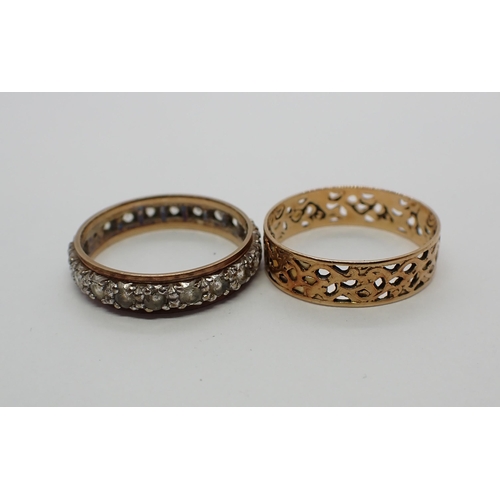 184 - An Eternity Ring set synthetic spinels, stamped 9ct, ring size N, approx 2.30gms and a pierced 14ct ... 