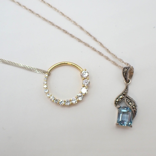 213 - A white metal Necklace, a circular Pendant set CZ on silver chain, a Pendant set marcasite and blue ... 