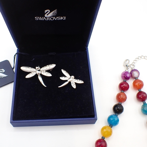 221 - A Swarovski Dragonfly Brooch and Badge, a pair of Jersey Pearl cultured pearl Ear Studs, a multi-col... 