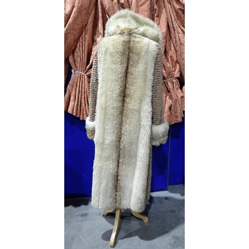 226 - A 1970's 'Astraka' faux fur acrylic Coat, size 14/16