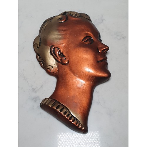 811 - A carved Horse's Head 1ft 4in H and an Art Deco style wall Plaque in the form of a ladies head (CAB)