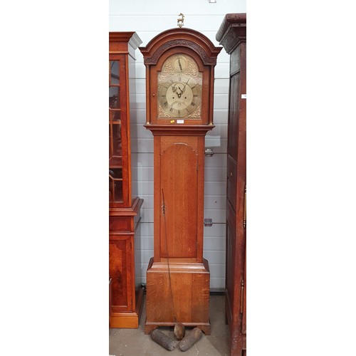 570A - Oak cased long case clock by James Mylne Montrose, with arched brass dial and a Eight day movement