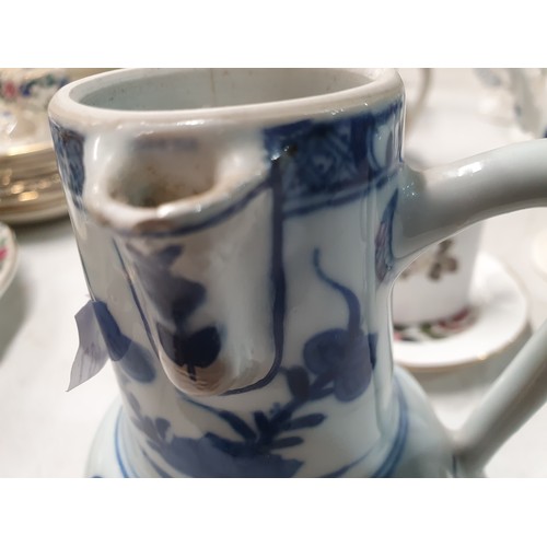 307 - A Chinese famille rose Jug and Cover, a Chinese blue and white Teapot and Cover A/F, a Chinese blue ... 