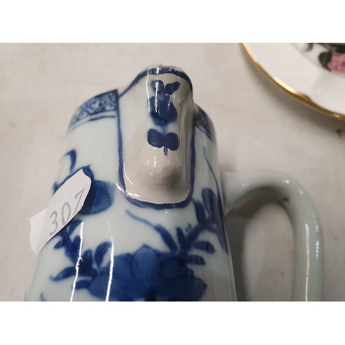 307 - A Chinese famille rose Jug and Cover, a Chinese blue and white Teapot and Cover A/F, a Chinese blue ... 