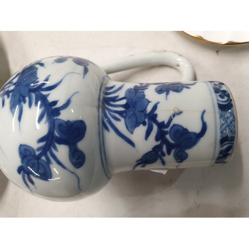 307 - A Chinese famille rose Jug and Cover, a Chinese blue and white Teapot and Cover A/F, a Chinese blue ... 