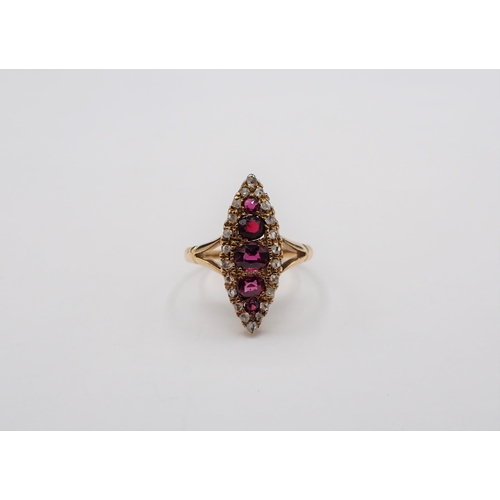 157 - An Edwardian Ruby and Diamond Ring pavé-set five graduated cushion-cut rubies (one replaced with gla... 