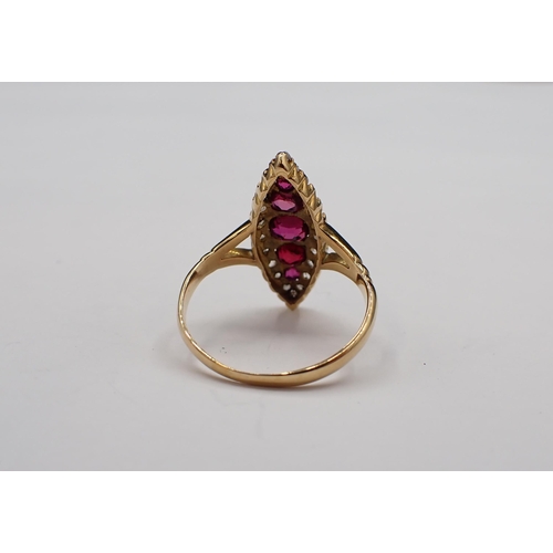 157 - An Edwardian Ruby and Diamond Ring pavé-set five graduated cushion-cut rubies (one replaced with gla... 