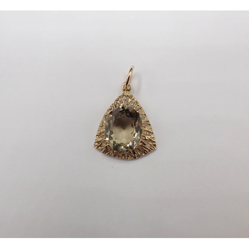 166 - A yellow Topaz Pendant claw-set oval-cut stone in 9ct gold open work frame, approx 2.10gms