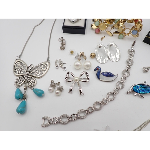 208 - A collection of Costume Jewellery including; Swarovski Bracelet, a duck Brooch set lapis lazuli in s... 