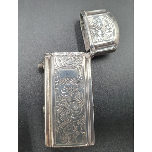 119 - A George V silver Cigarette Case with leafage scroll engraving and initials, Birmingham 1918, and an... 